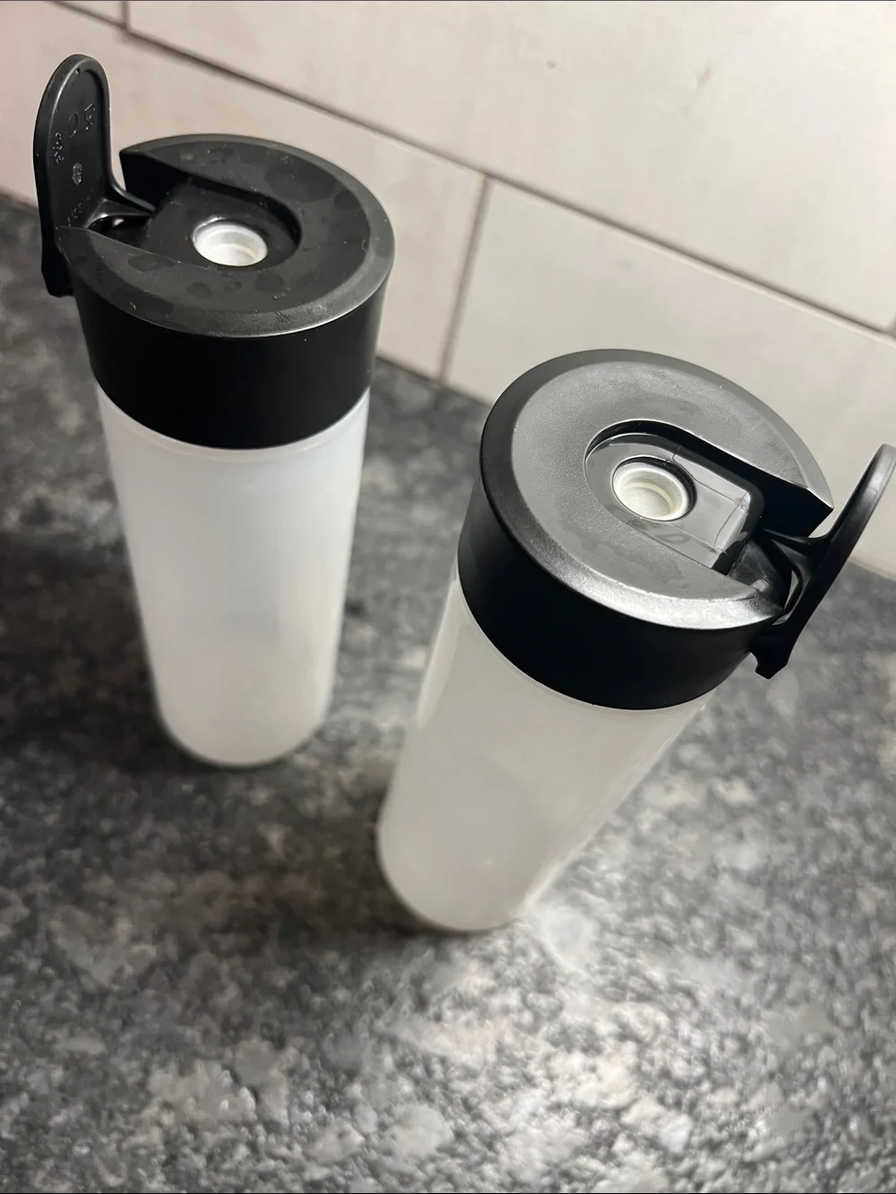 Tupperware Squeeze N Pour  Clear Plastic Shake & Pour Bottle with Black Flip Lid